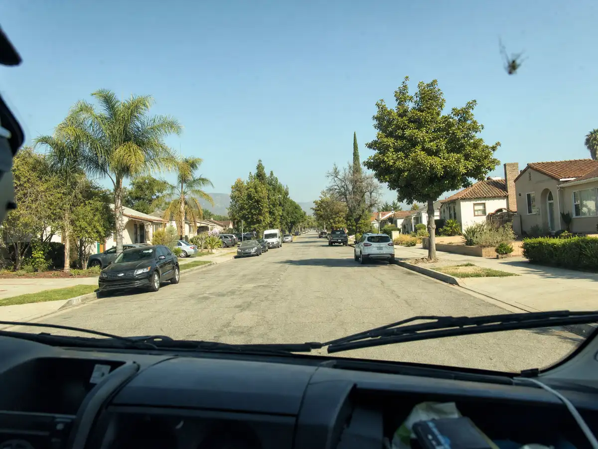 Service van arriving on a Baldwin Park, CA street — local same-day coverage